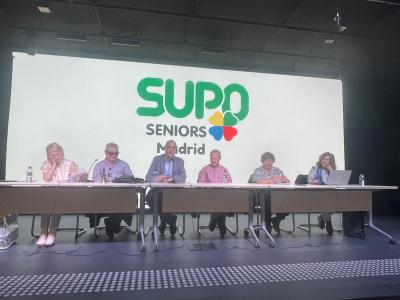 Mesa de personas que intervienen  en la asamblea, incluido el SG de UP, el Delegado de la ONCE en Madrid y la Presidenta del ConsejoTerritorial