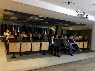 Salón de actos de la DT de Aragón con miembros de SUPO escuchando el webinar