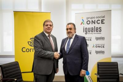 Los presidentes de ambas entidades se estrechan la mano