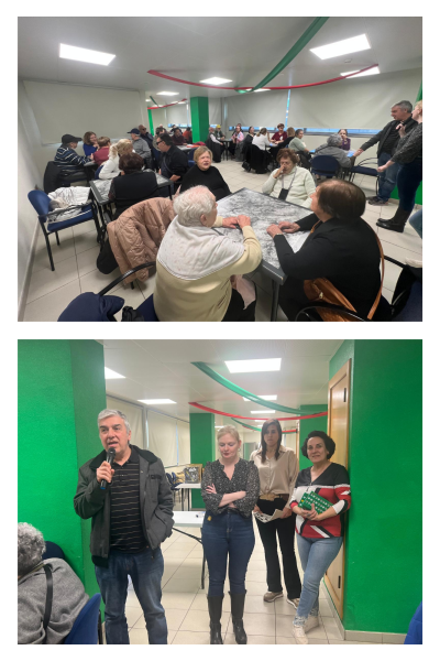 todos los asistentes en las mesas jugando al bingo y el Presidente de SUPO Alicante hablando con el micro, junto a una de sus Secretarias Adjuntas y las representantes de Servicios Sociales.