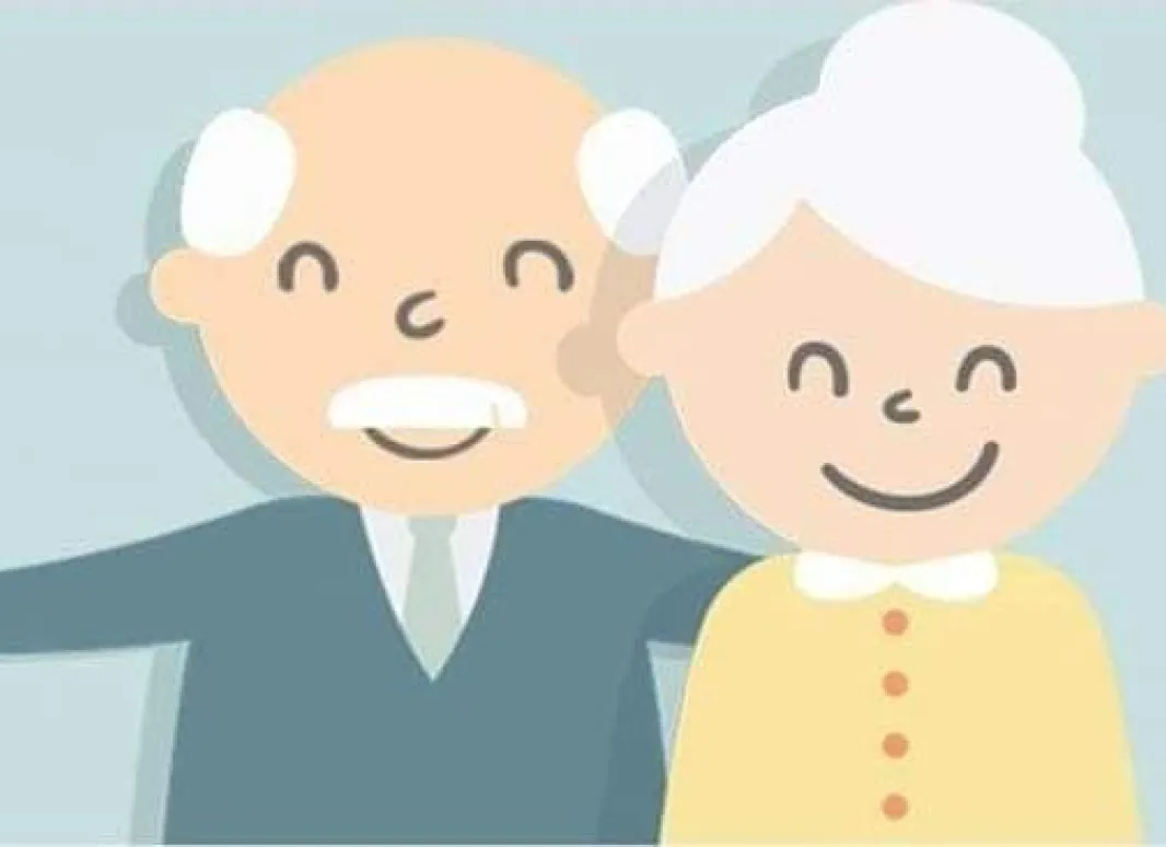 En la imagen se ve una pareja de ancianos sonriendo