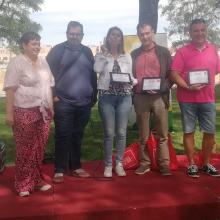 secretaria general de la agrupación junto con el representante de UTO y los premiados de este año