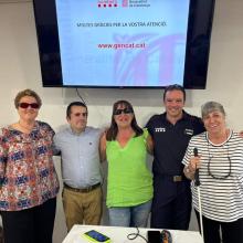 PRESIDENTA Y SECRETARIAS CSA SUPO GIRONA Y SECRETARIO GENERAL DE UP GIRONA CON EL JEFE DE BOMBEROS DE OLOT